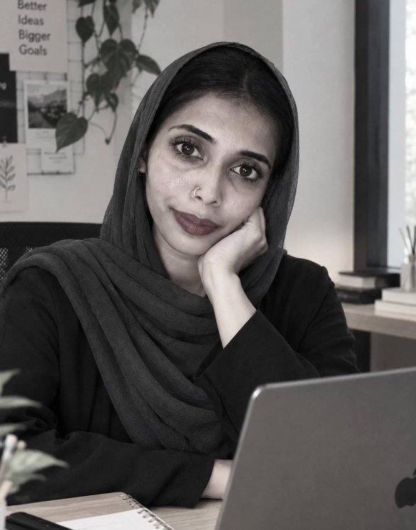 Risva Mehafin, Best Freelance Digital Marketing Expert in Malappuram, working on a laptop in a modern workspace.